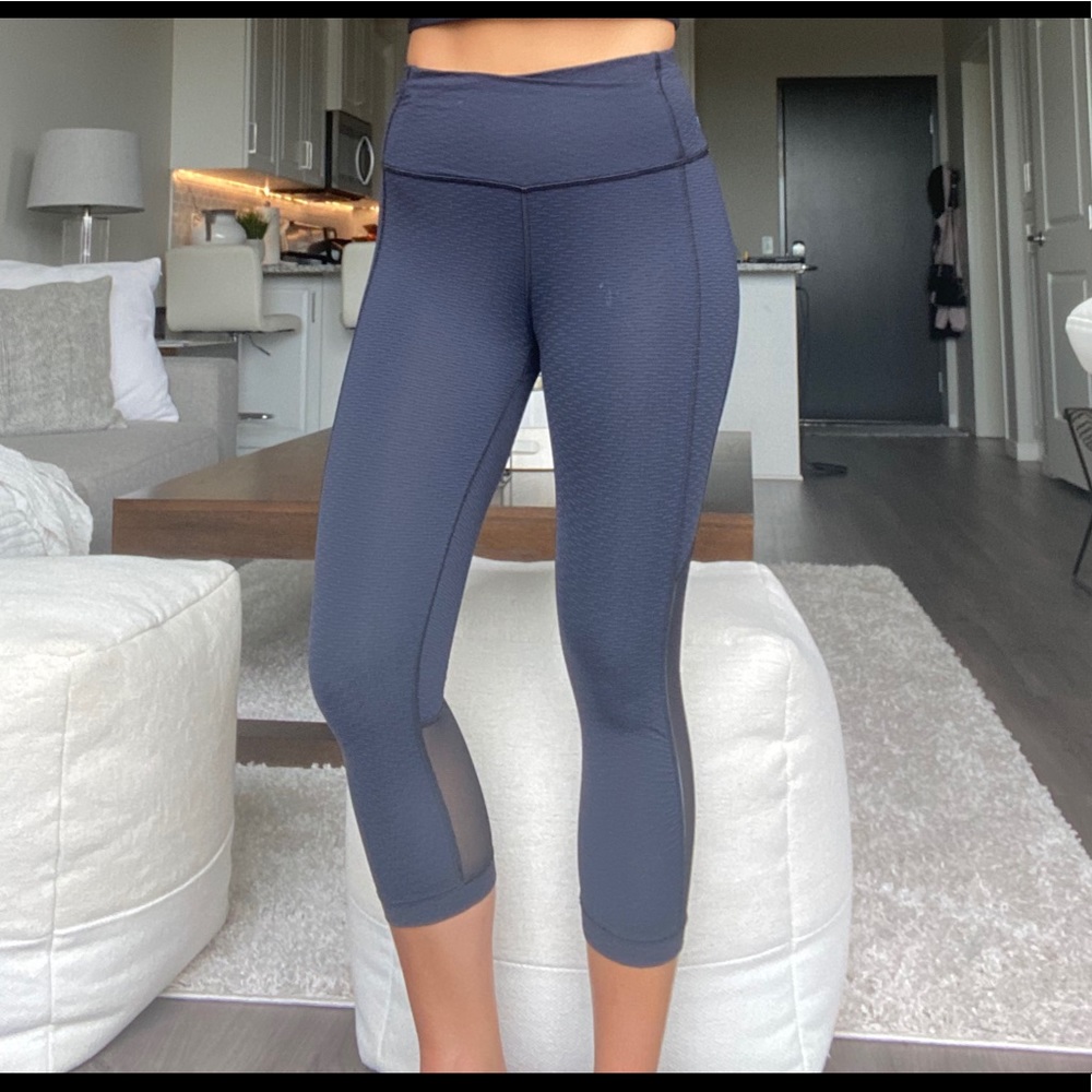 Navy blue and black cropped lululemon yoga pants